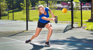 Woman playing pickleball