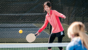 Girl playing pickleball