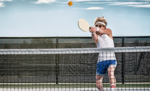 Man playing Pickleball