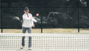 Old lady Playing Pickleball