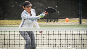 Lady playing Pickleball